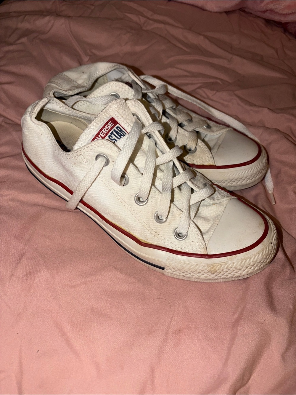 Converse Low Top Sneakers in White with Red Trim